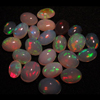 The Most Beautifull Highest Quality ETHIOPIAN Opal - Oval Shape Cabochon - Every Pcs Have Full Amazing Flashy Fire size - 5x7- 7x9 mm - 24 pcs